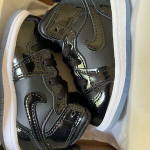 Jordan Black and White High-Top Sneakers